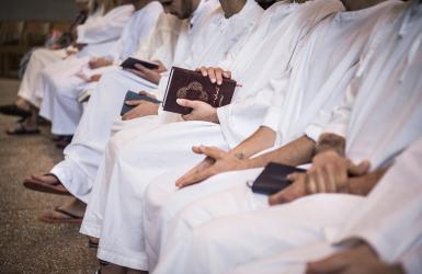 Men with a book in their hands