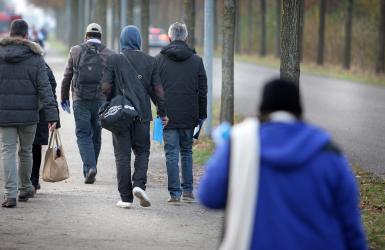 Asielzoekers op de weg